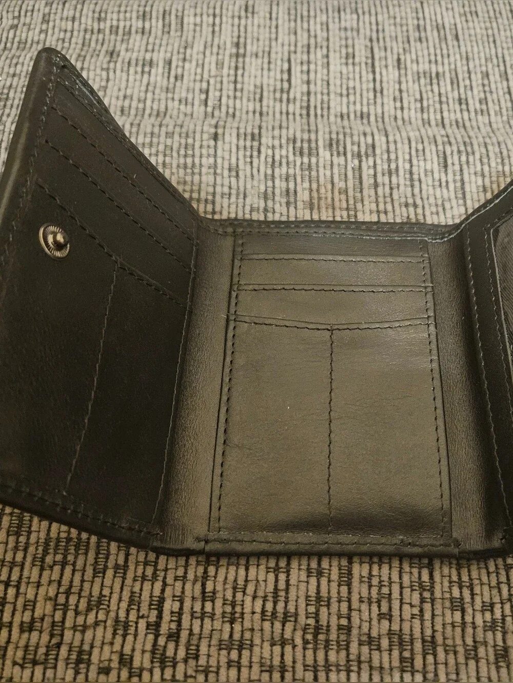Hand-Tooled Black Leather Wallet with Brown Floral Accent